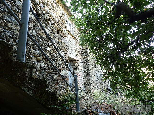 Stone building partially converted in Pampilhosa